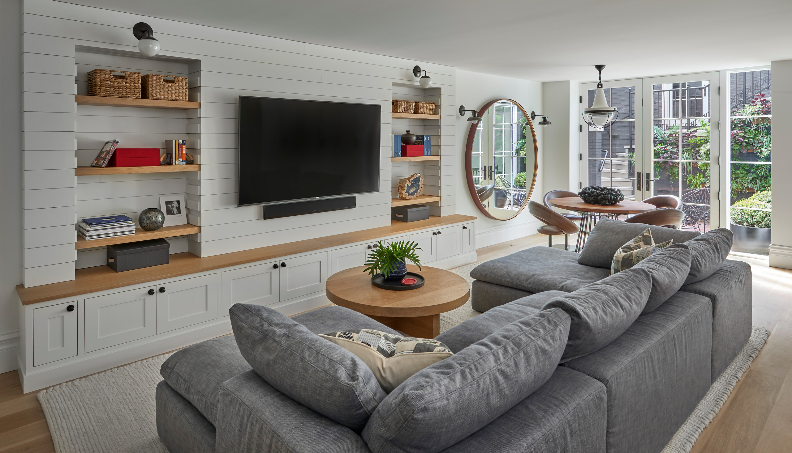 Living room renovation with custom built-in shelving